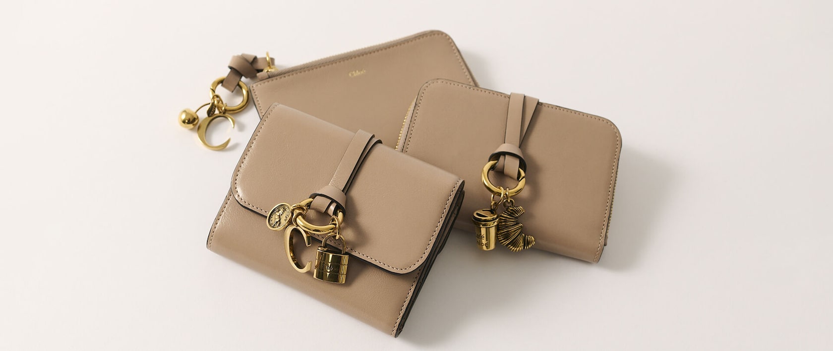 Alphabet tri-fold, purse and compact wallet in sweet beige