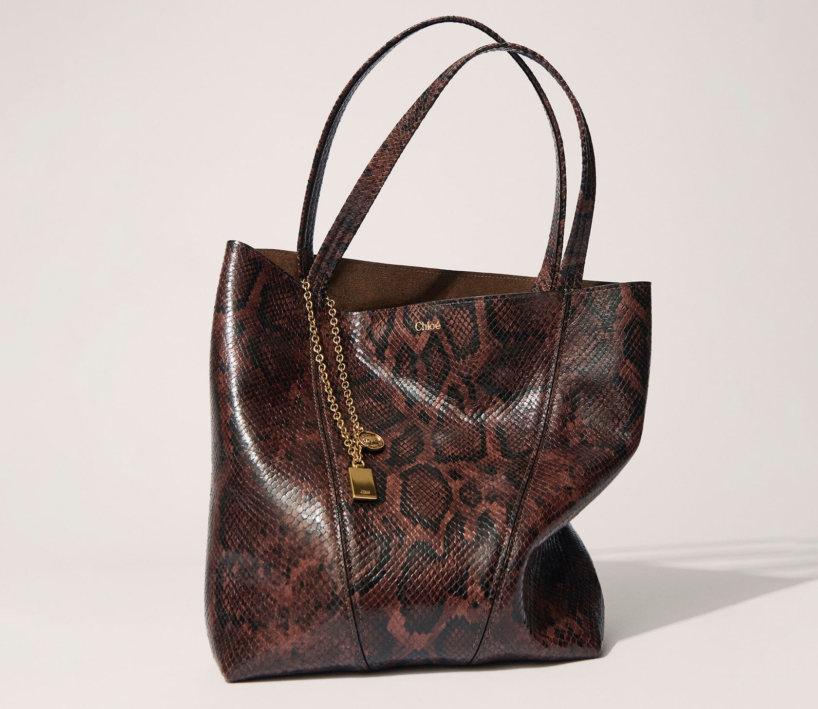 Luxury Chloé Spin tote bag in python-effect leather 