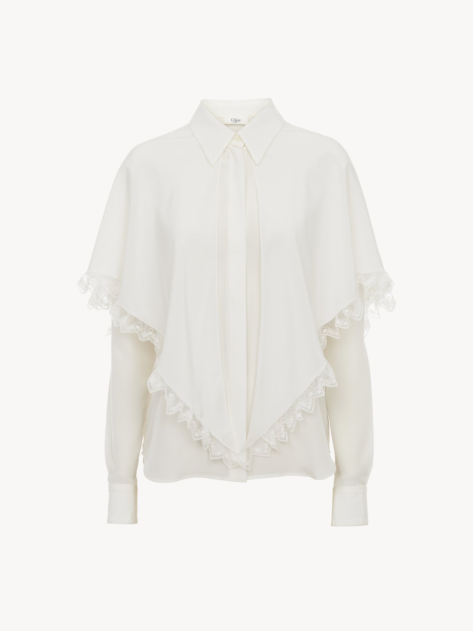 Knotted heritage cape blouse in silk Organic crêpe de chine
Iconic Milk