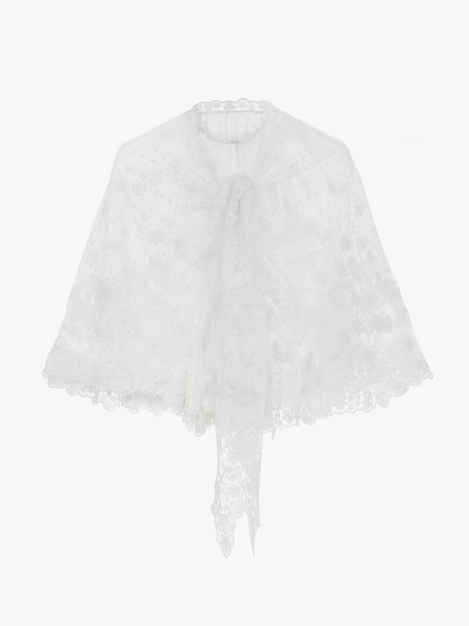 Front-tie cape top in floral lace Floral lace embroidery
Iconic Milk