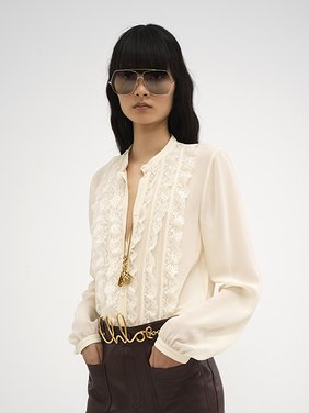 Collarless ruffled blouse in silk georgette Organic silk georgette
Pristine White Product detail