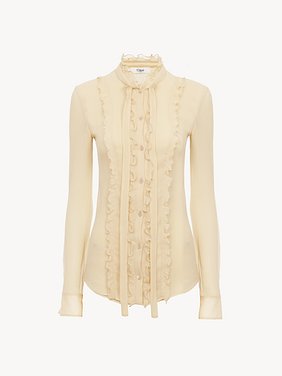 Ruffled fitted blouse in silk crêpon Iconic organic silk crêpon
Light Sand