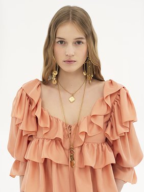 Cropped ruffle top in washed silk poplin Washed silk poplin
Shell Coral Front view of the product being worn