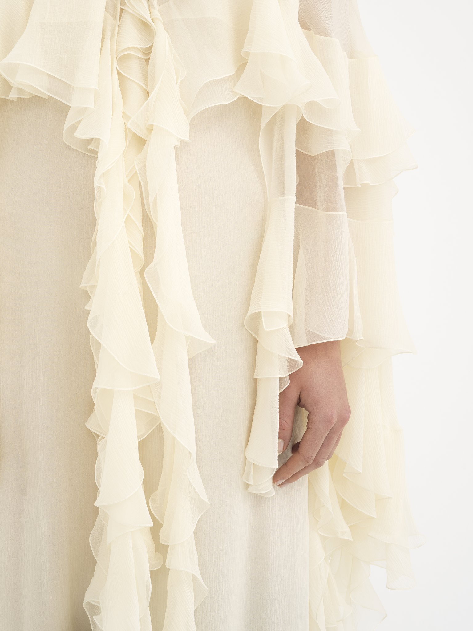 Long ruffled dress in silk mousseline Organic silk mousseline
Whisper White Front view of the product being worn