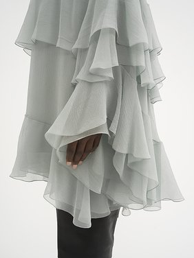 Mini ruffled dress in silk mousseline Organic silk mousseline
Desert Green Front view of the product being worn