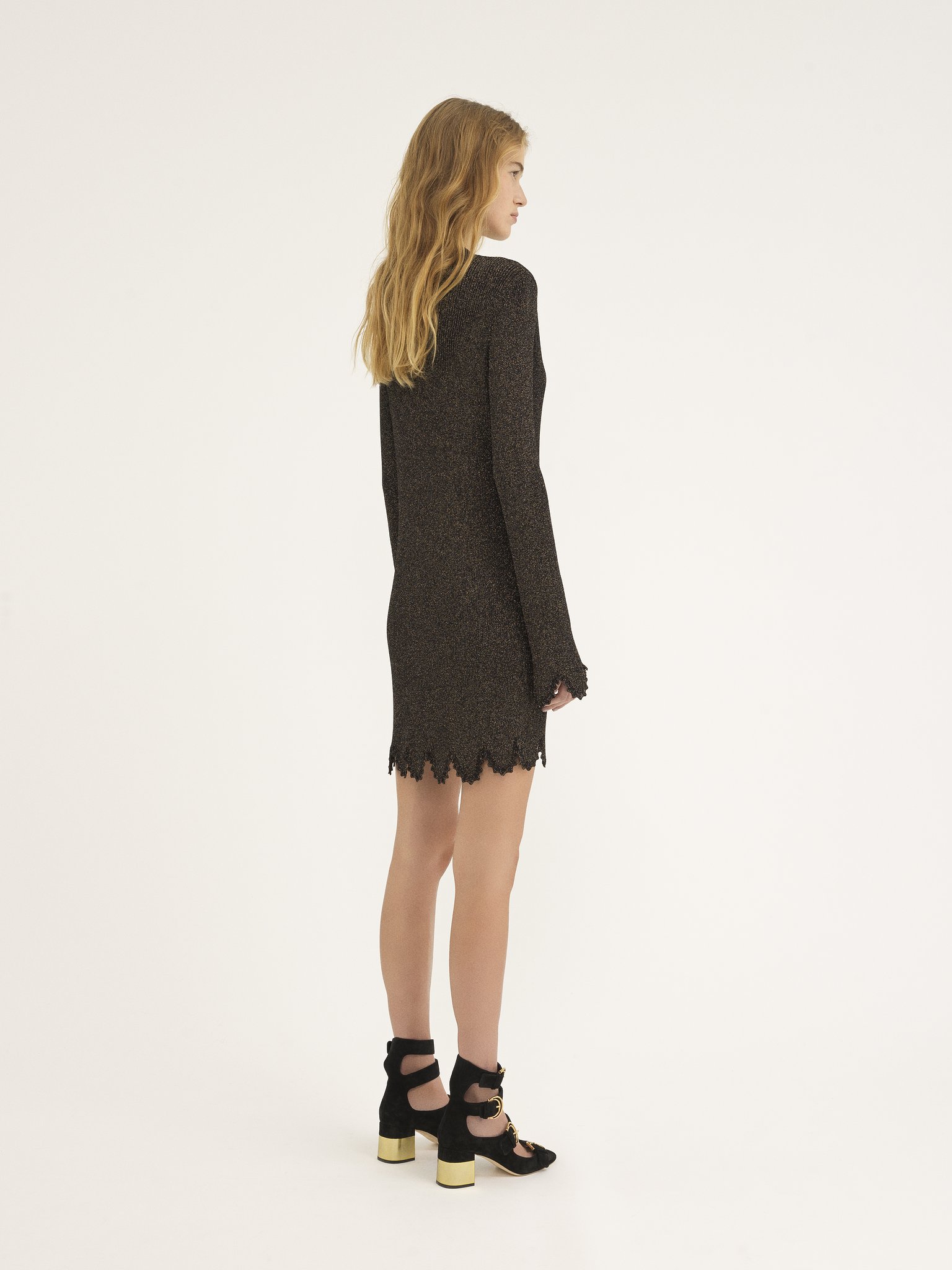 Fitted scallop dress in viscose-blend knit Viscose & metallic lurex rib knit
Black Top view of the product