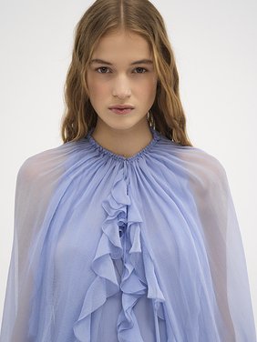 Long cape dress in silk mousseline Organic silk mousseline
Idyllic Blue Front view of the product being worn