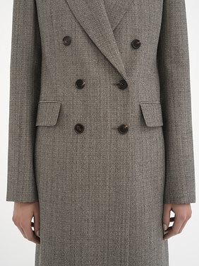 Tailored coat in wool & cotton tweed Lower-impact wool & cotton tweed
Black & White Front view of the product being worn