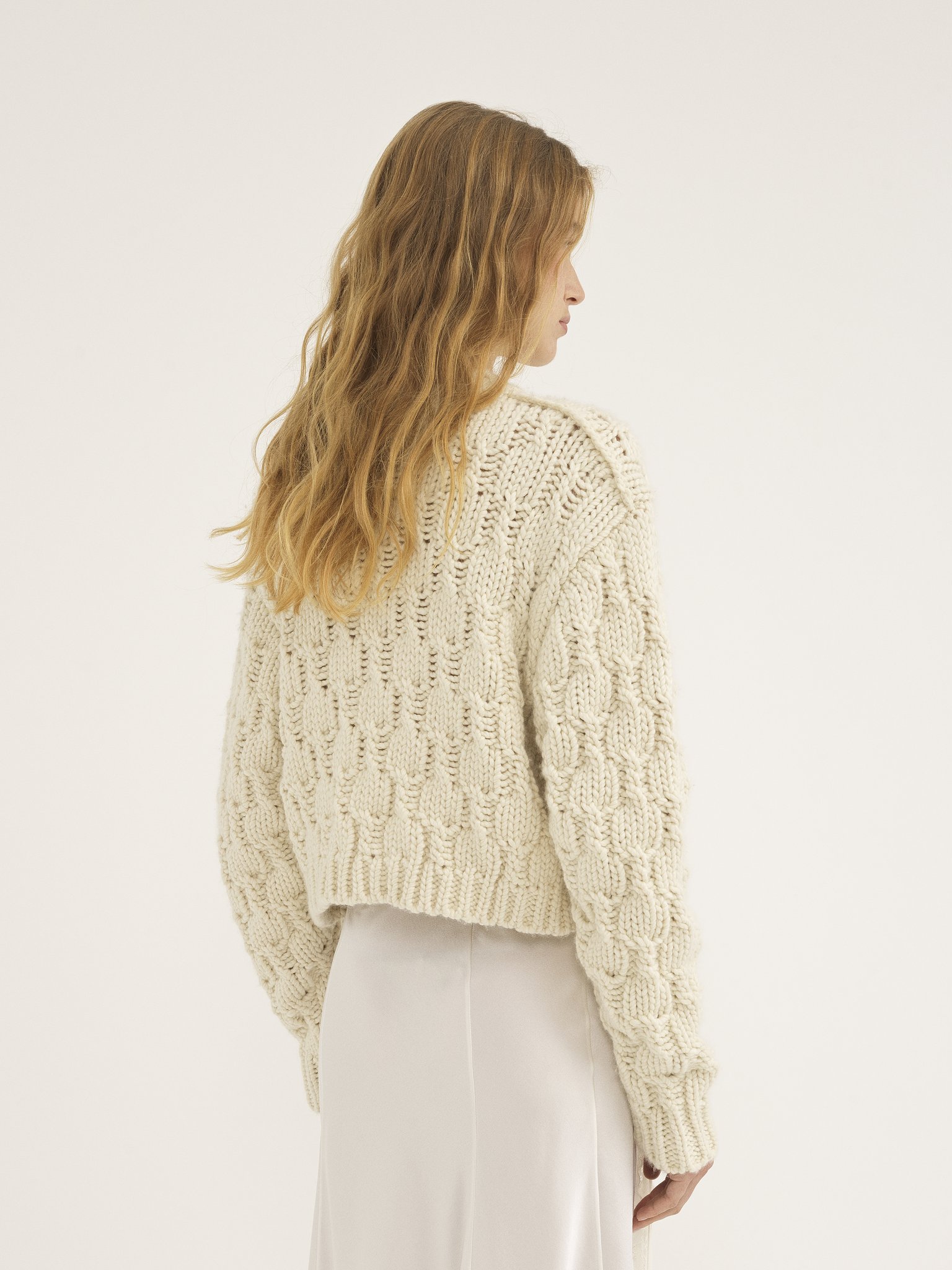 Cropped intarsia knitted sweater in wool blend Wool, silk & cashmere aran knit
Iconic Milk Top view of the product