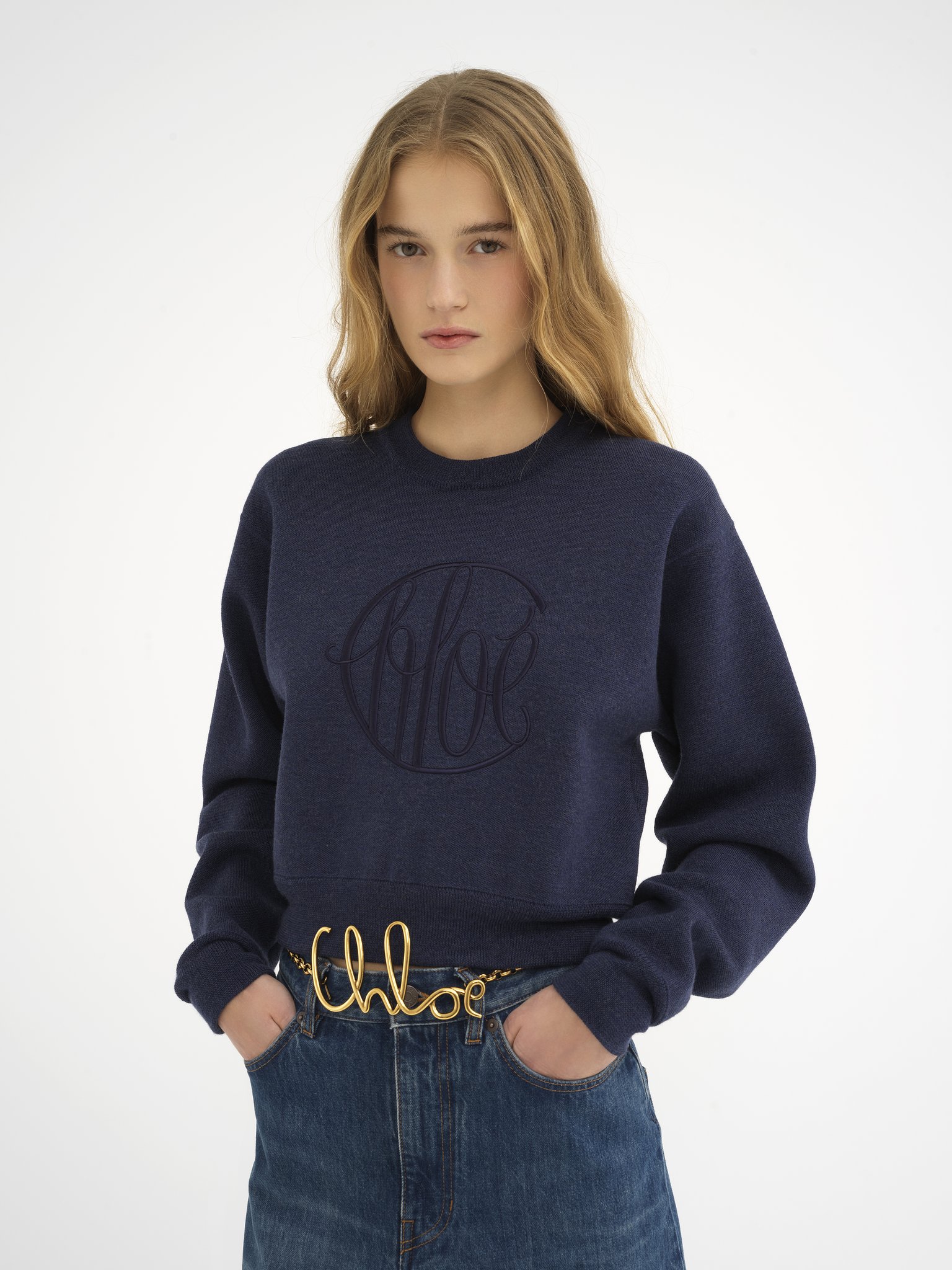 Knitted logo sweater in wool Lower-impact signature knit
Classic Navy Product detail