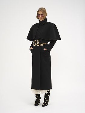 Long coat in double-face wool with cape Lower-impact double-face wool
Black Product detail