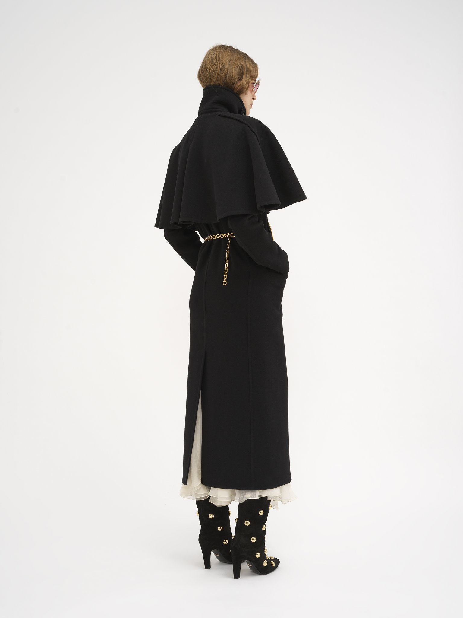 Long coat in double-face wool with cape Lower-impact double-face wool
Black 