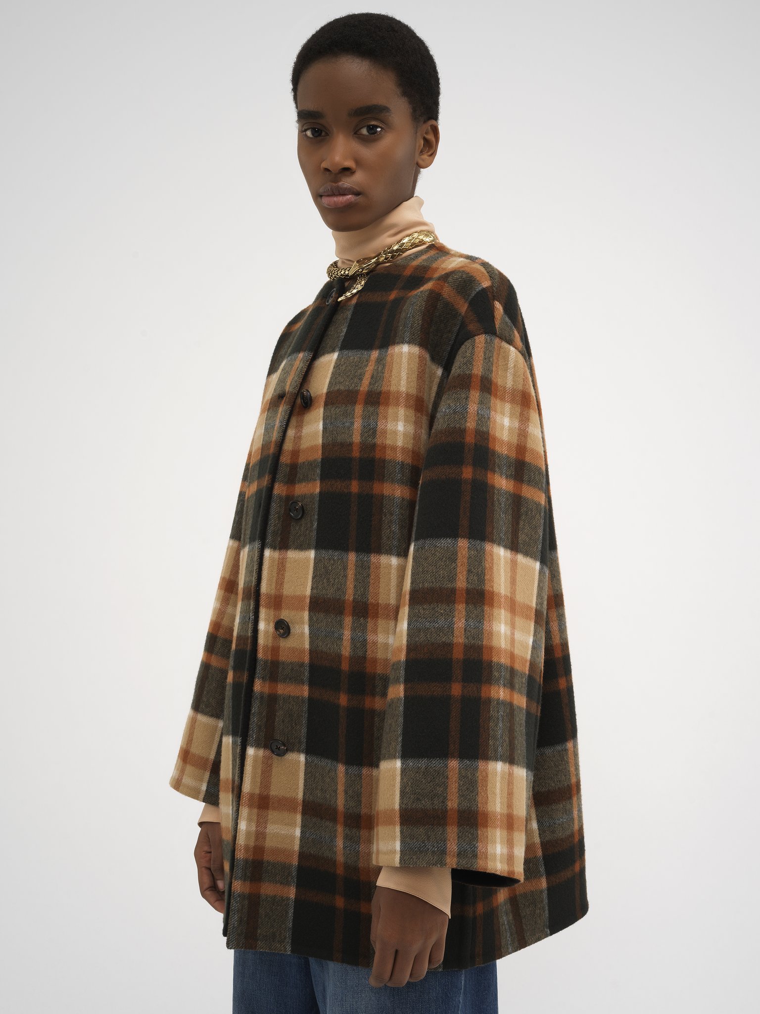 Mid-length coat in checked wool Lower-impact double-face checked wool
Black & Brown Product detail