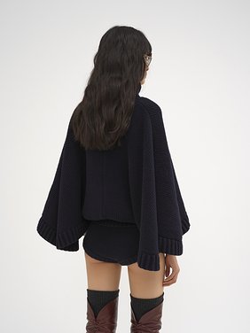 Short turtleneck cape Lower-impact wool & cashmere knit
Classic Navy Top view of the product