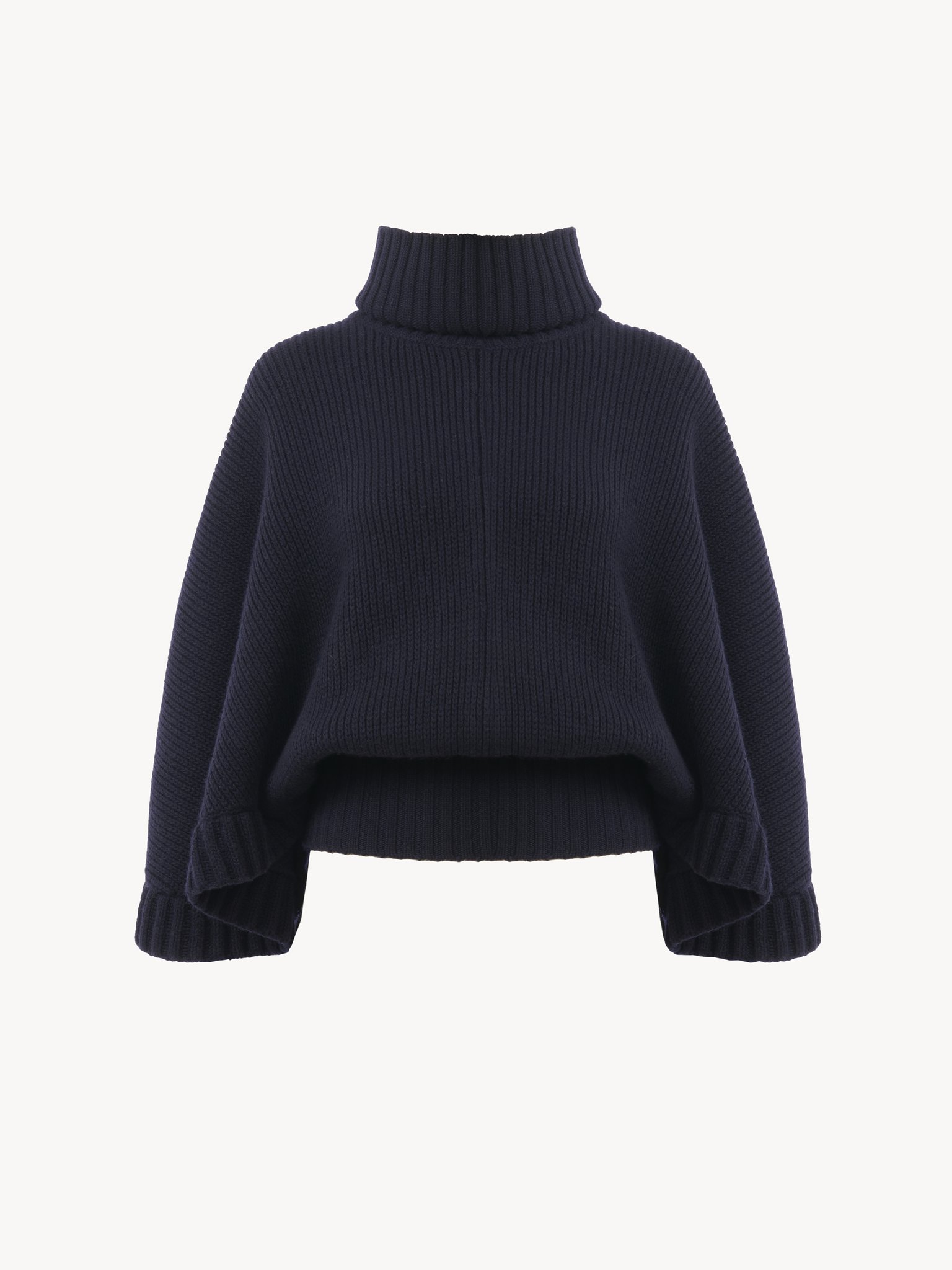 Short turtleneck cape Lower-impact wool & cashmere knit
Classic Navy