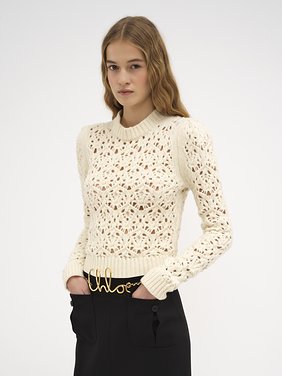 Körperbetonter Pullover aus Wollstrick Grobes Pointelle-Wollstrick
Iconic Milk Detail des Artikels