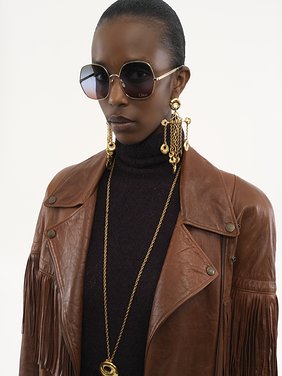 Belted fringed jacket in leather Soft glossy vegetable-tanned leather
Clay Brown Front view of the product being worn