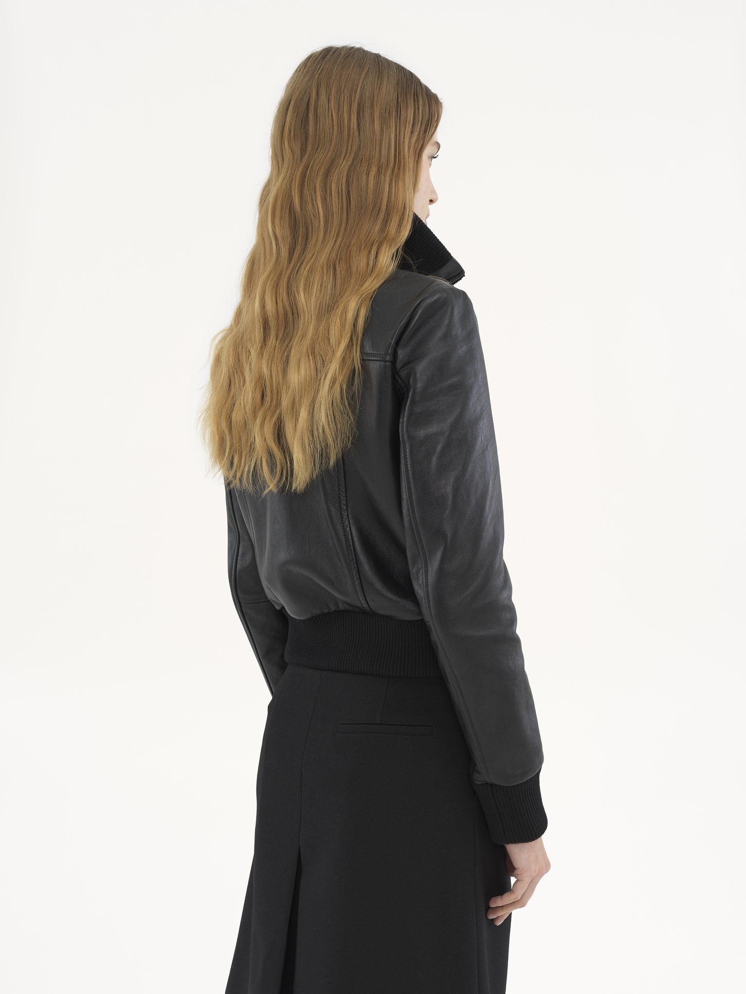 Short blouson in leather Soft glossy leather
Black Top view of the product