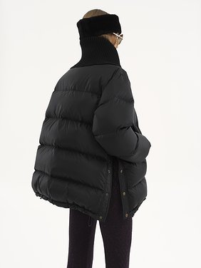 High-neck puffer jacket in shiny nylon Shiny recycled nylon
Black Top view of the product