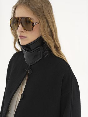 Oversized mid-length coat in wool Iconic soft wool
Black Front view of the product being worn