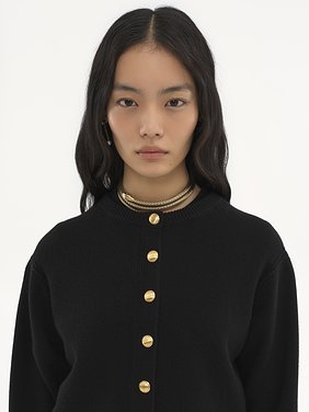 Embroidered cardigan in wool & cashmere knit Snake capsule lower-impact wool knit
Black Front view of the product being worn