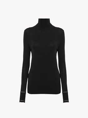 Fitted turtleneck in wool knit Lower-impact wool ribbed knit
Black