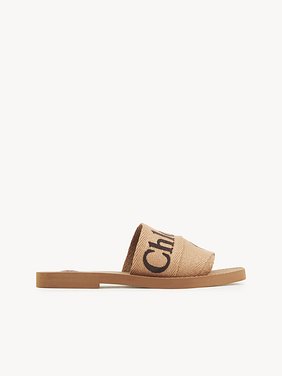 Woody mule Embroidered linen
Dark Tan