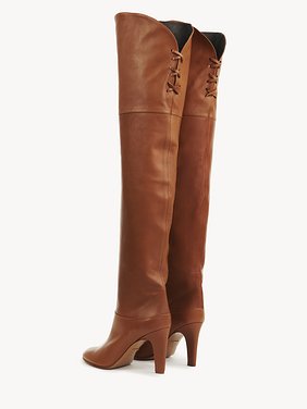 Eve over-the-knee boot Shiny calfskin
Clay Brown Front view of the product being worn