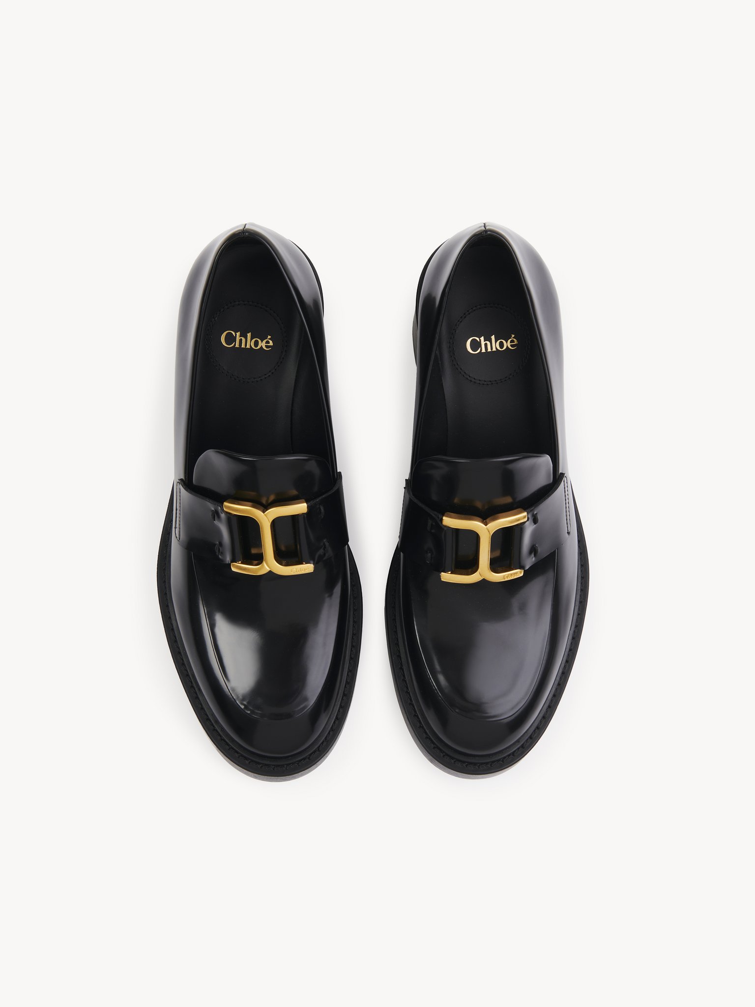 Marcie heeled loafer Shiny calfskin
Black 