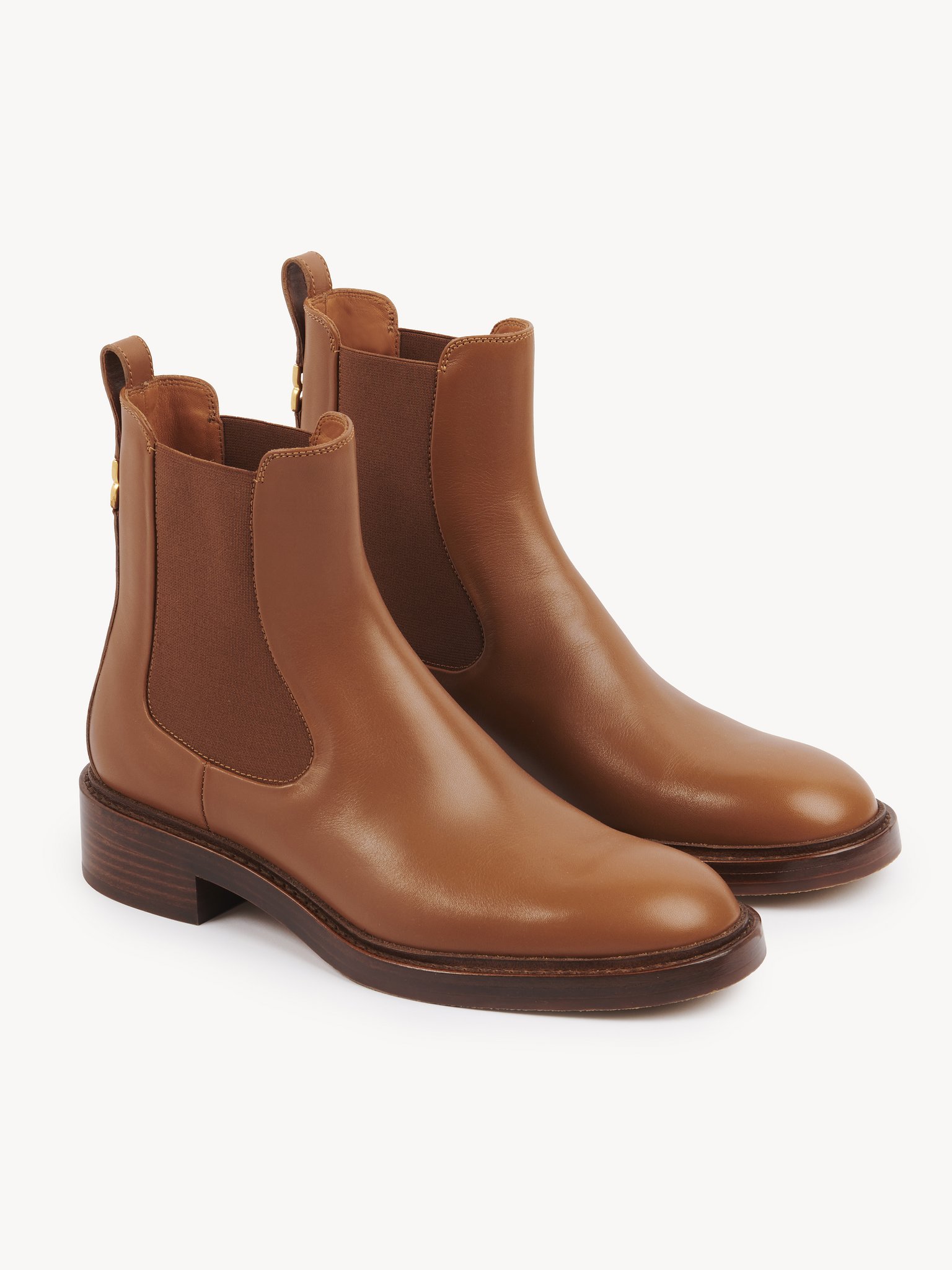 Marcie ankle boot Shiny calfskin
Clay Brown Product detail