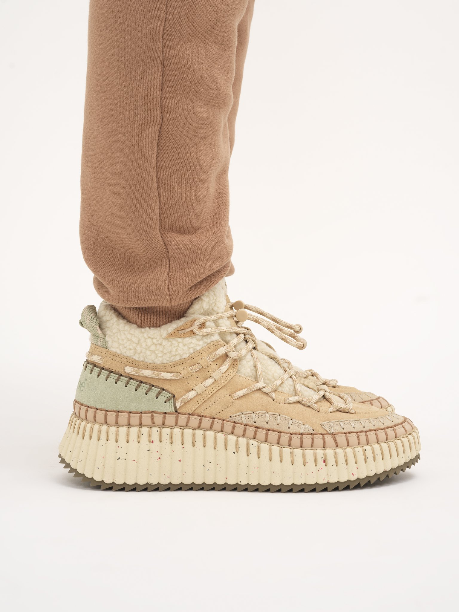 Nama lace-up sneaker Suede calfskin with shearling
Milky Mint Back view of the product