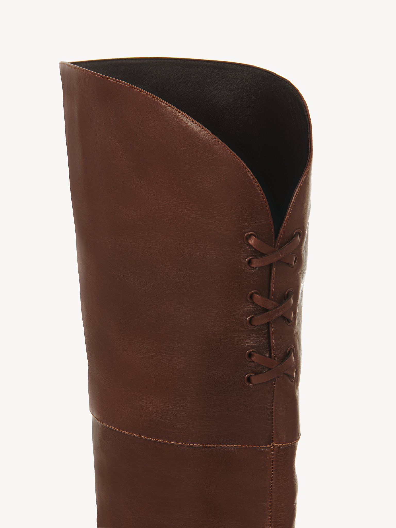 Eve thigh high boot Vintage-effect calfskin
Sooty Brown Front view of the product being worn