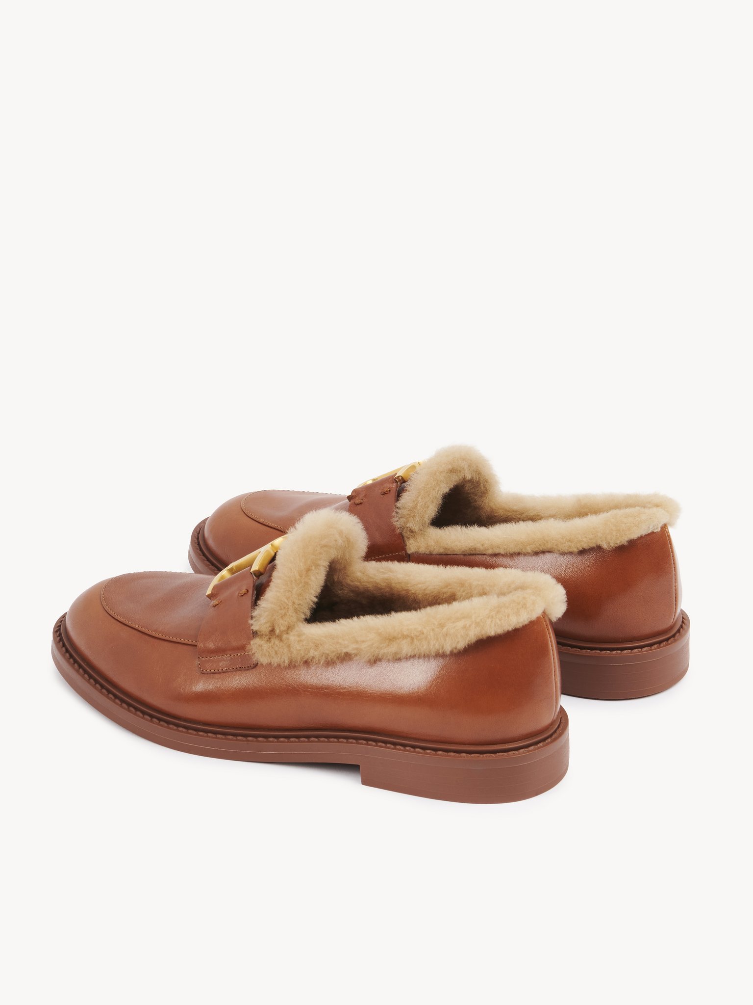 Marcie loafer Calfskin with shearling
Cognac Brown Front view of the product being worn