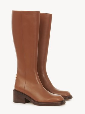 Marcie heeled boot Shiny calfskin
Clay Brown Product detail