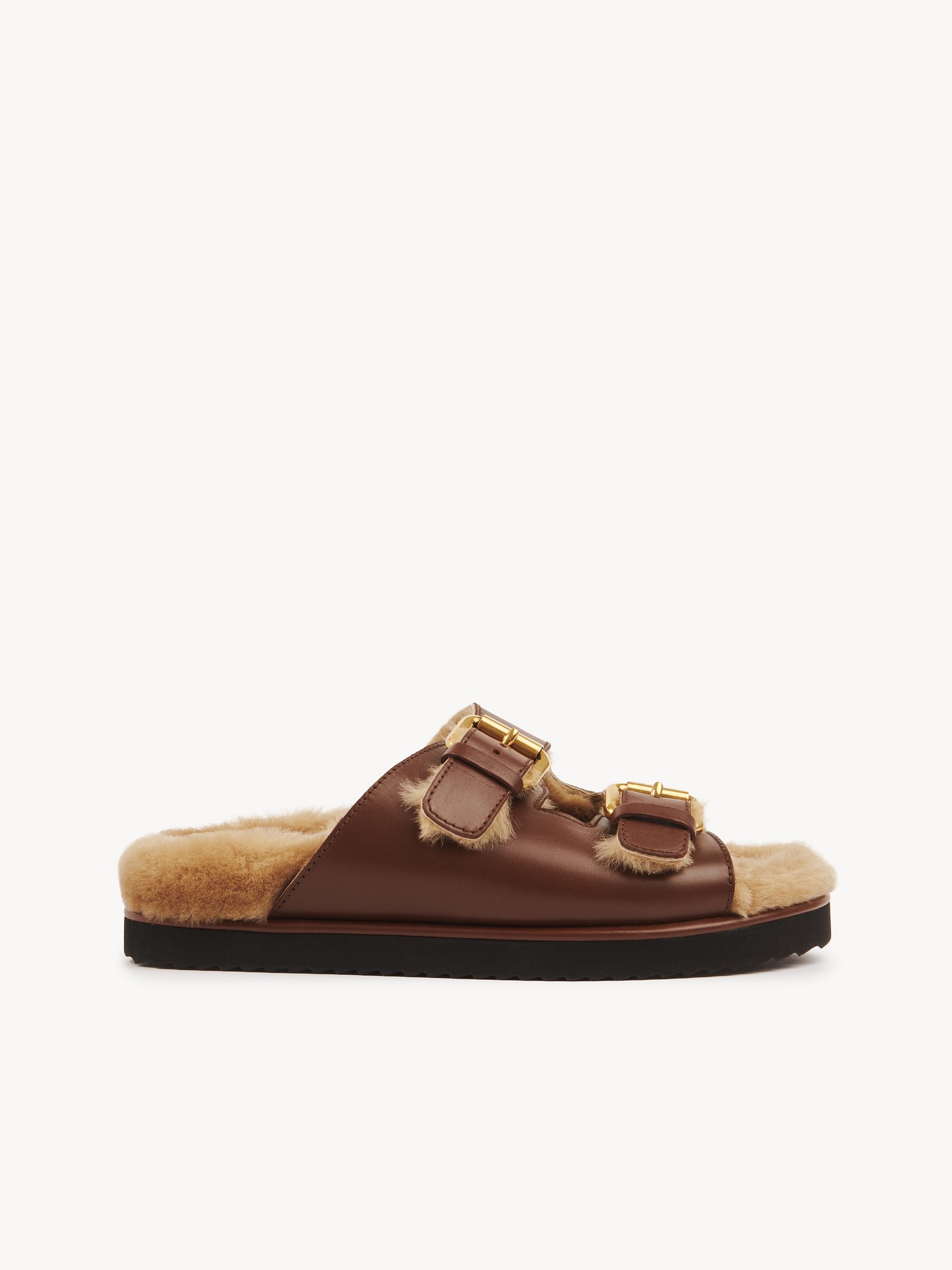 Nil slide Calfskin with shearling
Sooty Brown