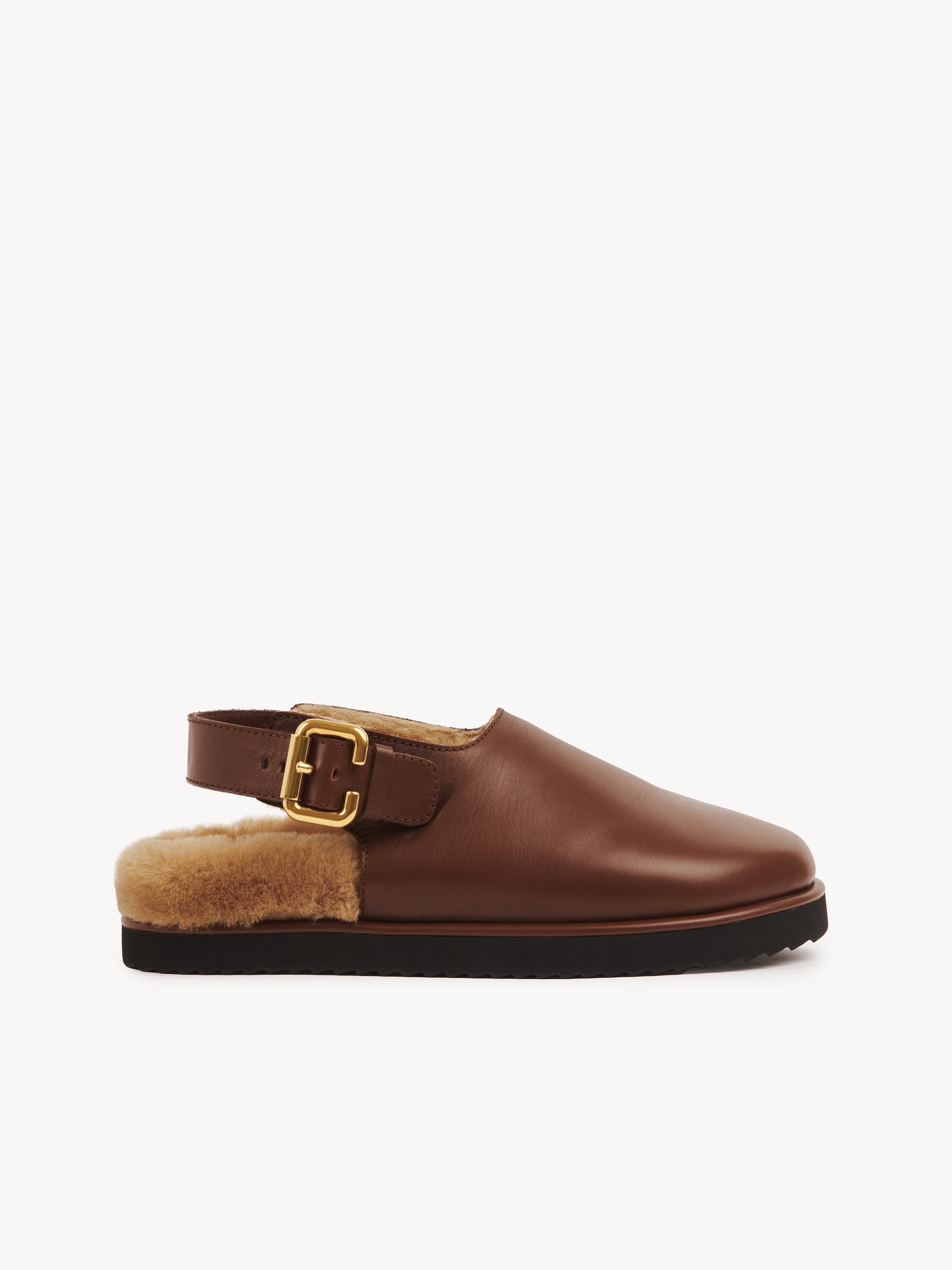 Nil mule Calfskin with shearling
Sooty Brown