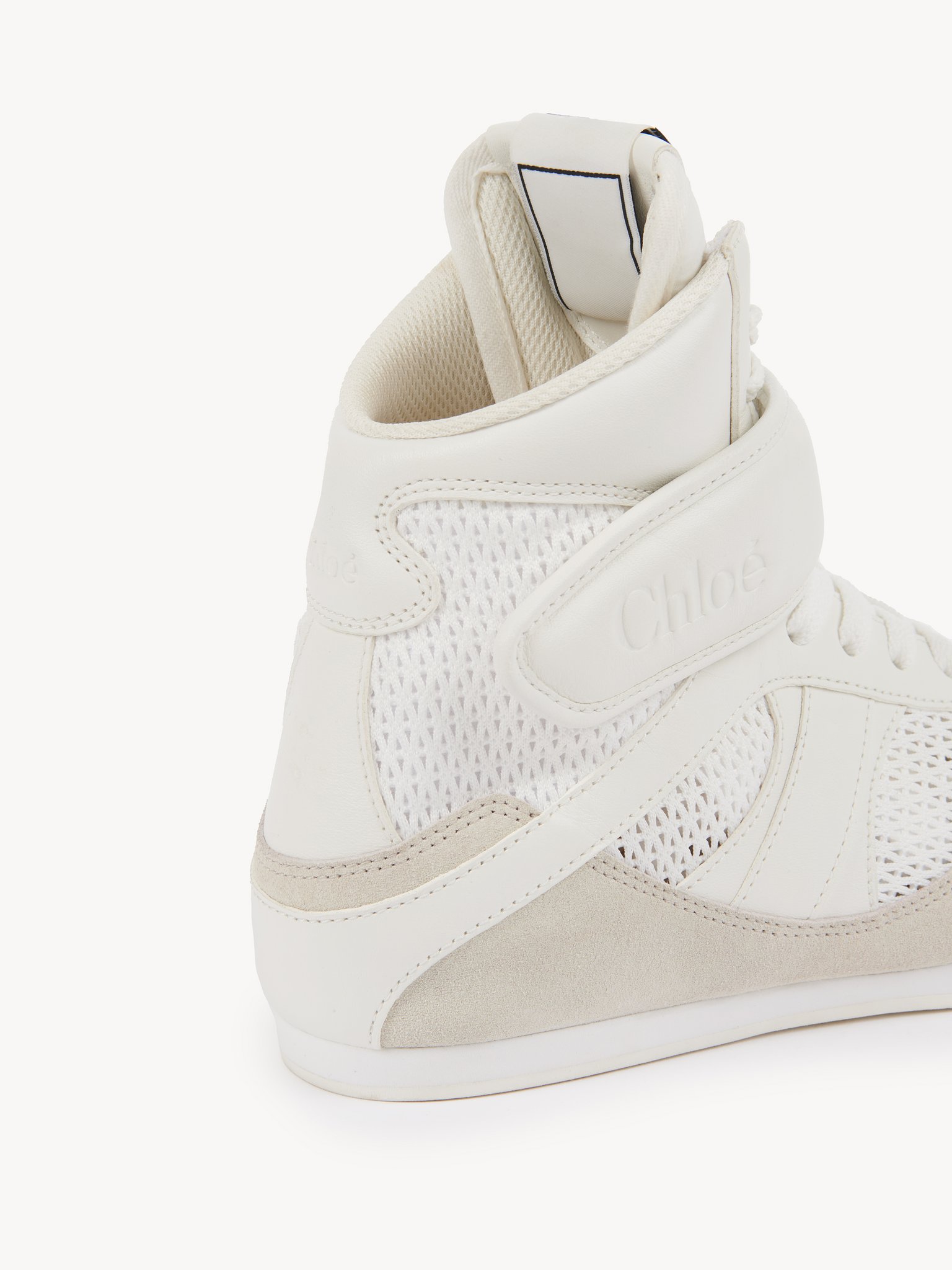 Chloé Kick high-top sneaker Mesh & calfskin
Cloudy Cream Front view of the product being worn