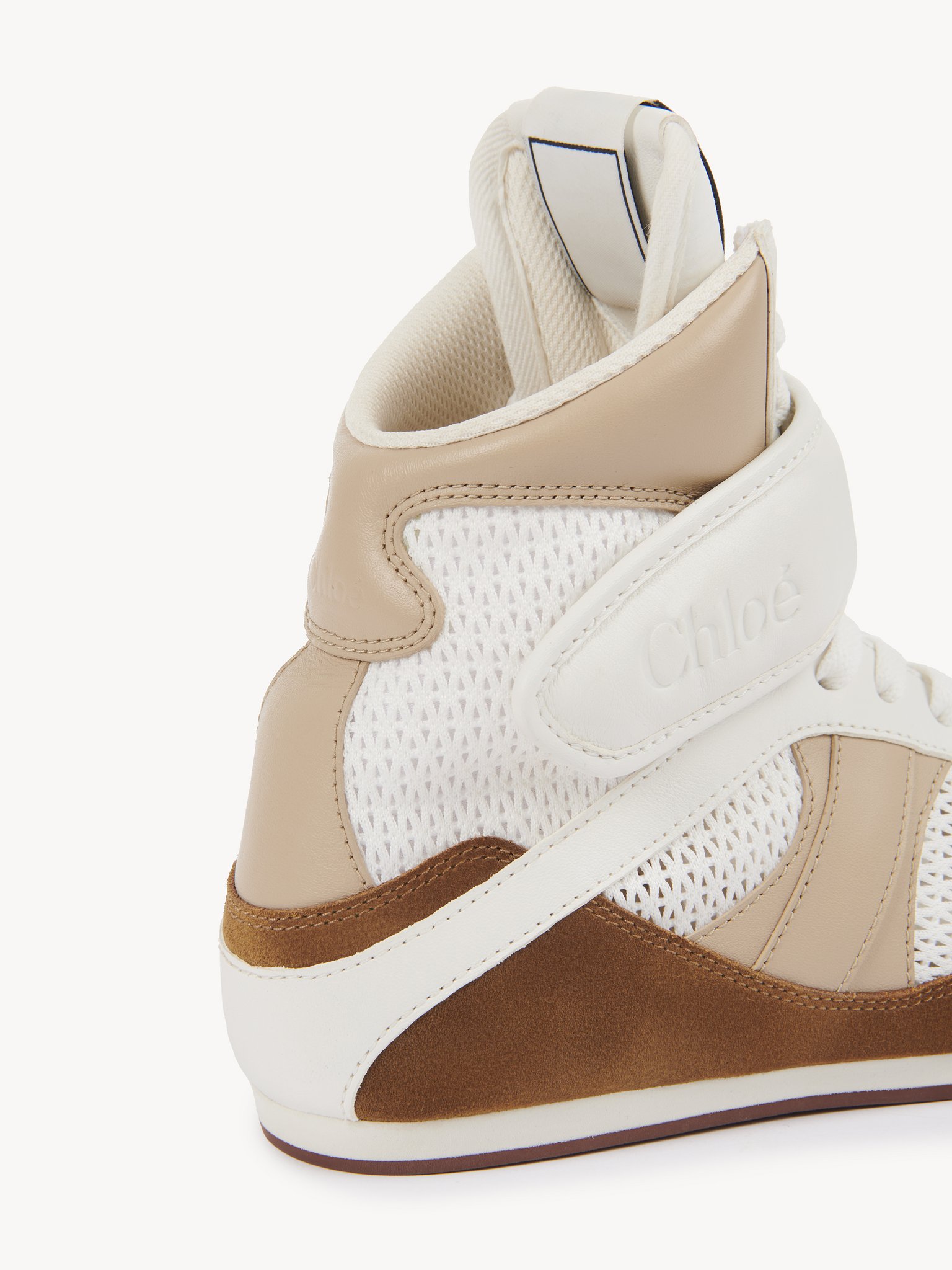 Chloé Kick high-top sneaker Mesh & calfskin
Natural Brown Front view of the product being worn