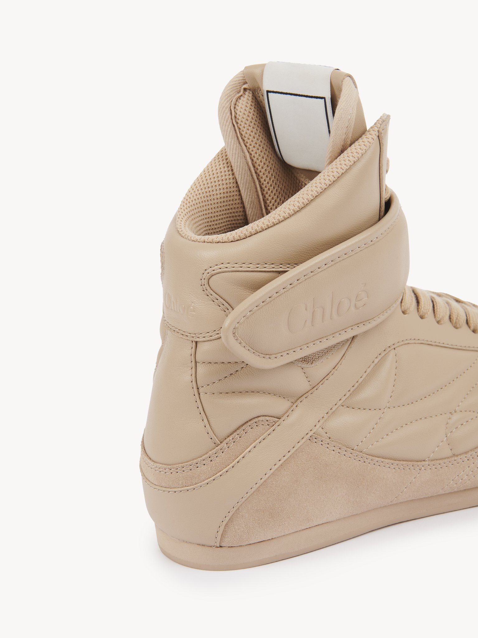 Chloé Kick high-top sneaker Calfskin
Pink Tea Front view of the product being worn