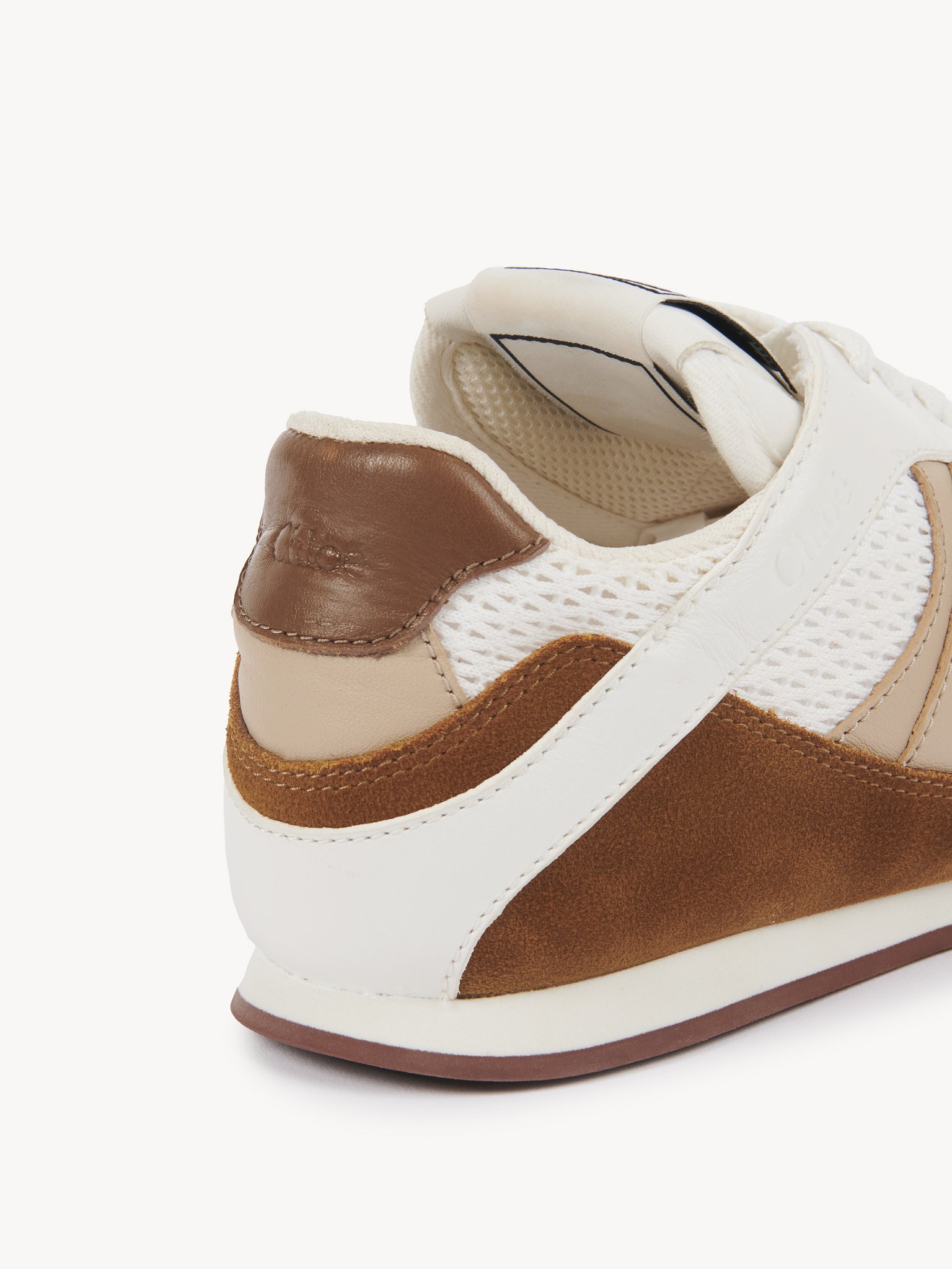 Chloé Kick sneaker Mesh & calfskin
Natural Brown Front view of the product being worn