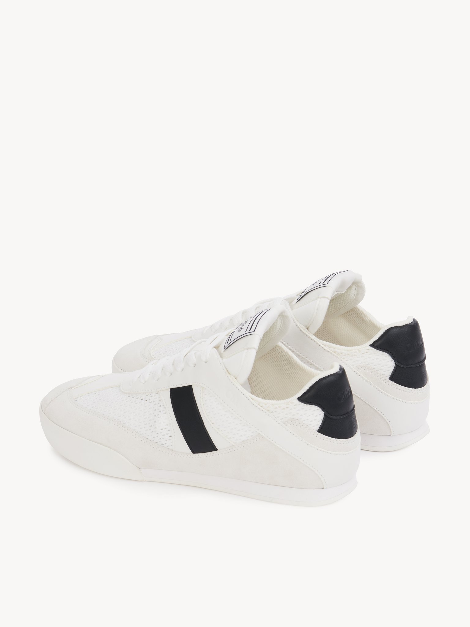 Chloé Kick sneaker Mesh & calfskin
White - Black Front view of the product being worn