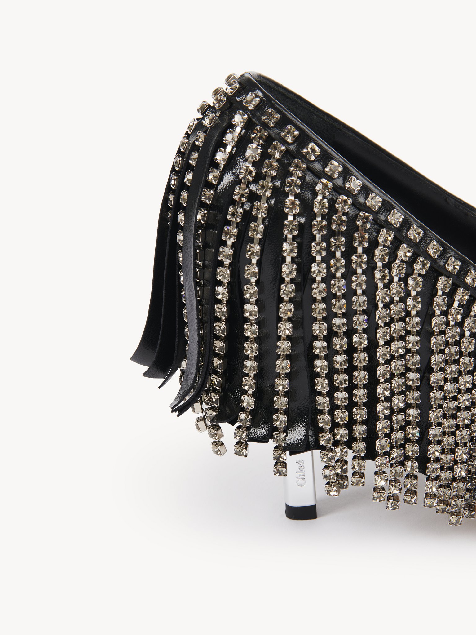 Mona pump Sheepskin & strass
Black Silver Front view of the product being worn