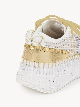 Nama sneaker Lower-impact mesh & crackled calfskin
Gold Front view of the product being worn