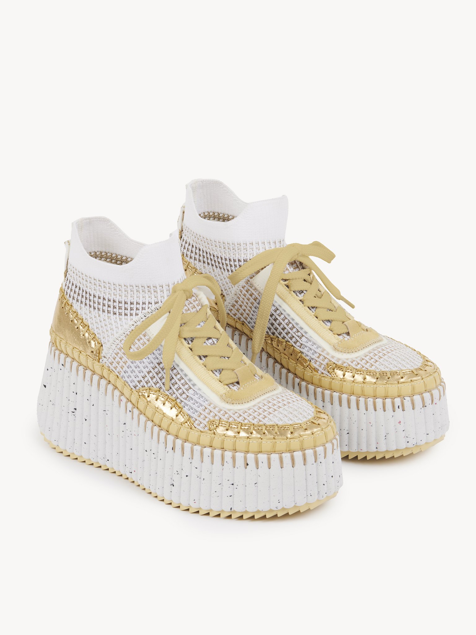 Nama wedge sneaker Lower-impact mesh & crackled calfskin
Gold Product detail