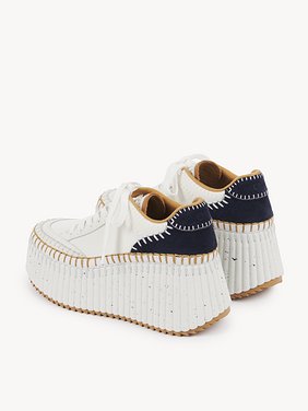 Nama wedge sneaker Cowhide mix
Royal Navy Front view of the product being worn