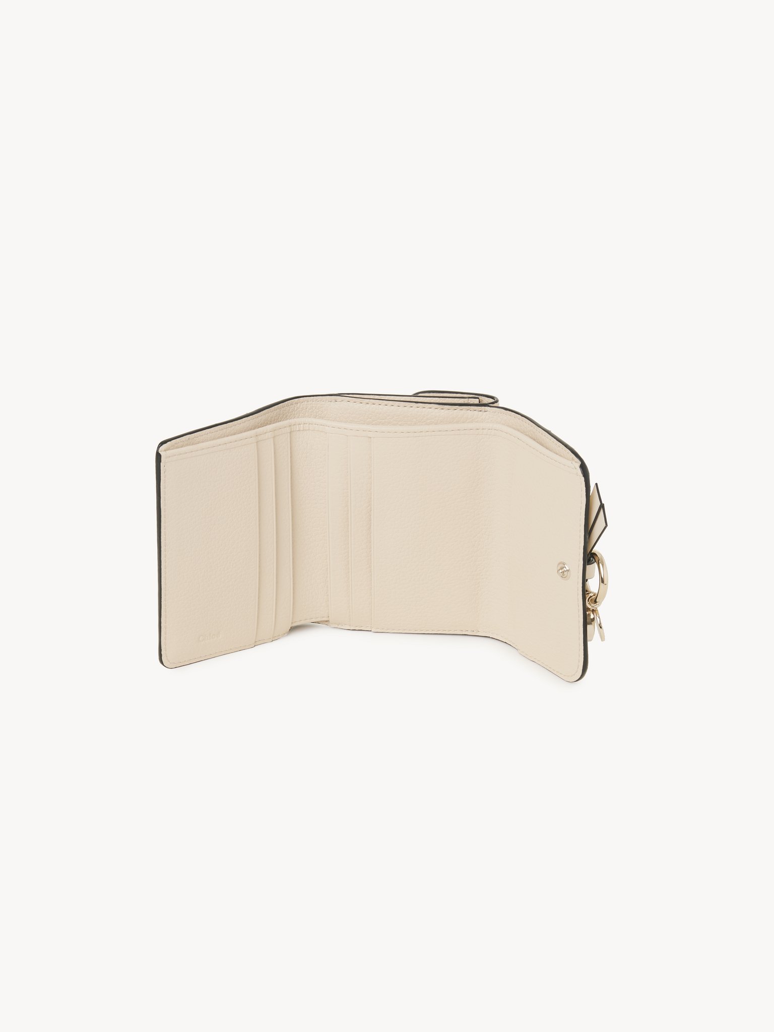 Small Alphabet tri-fold in grained leather Grained & shiny calfskin
Sweet Beige Product detail