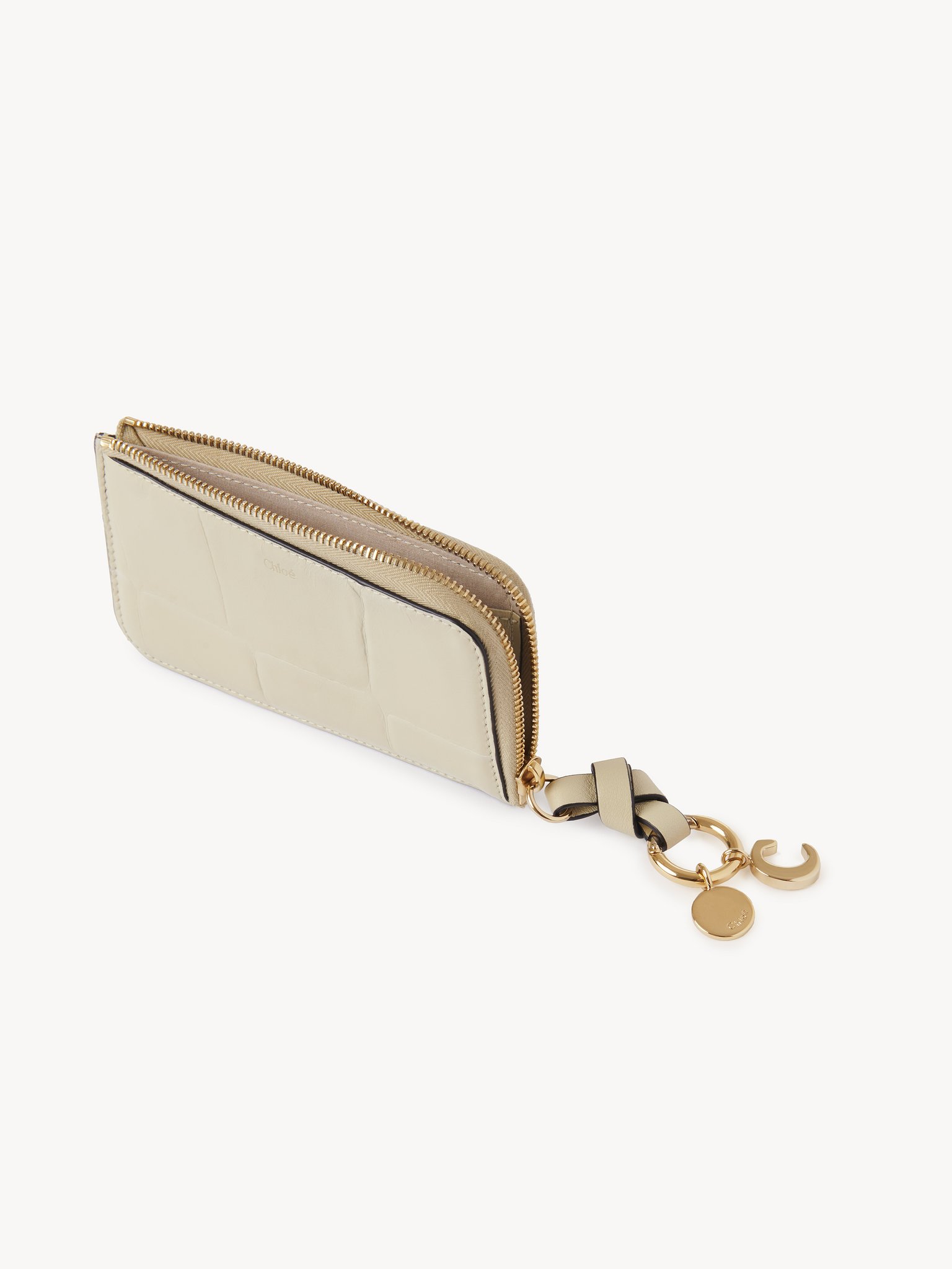 Alphabet wallet in croco-effect leather Croco-effect calfskin
Vegetal Beige Product detail