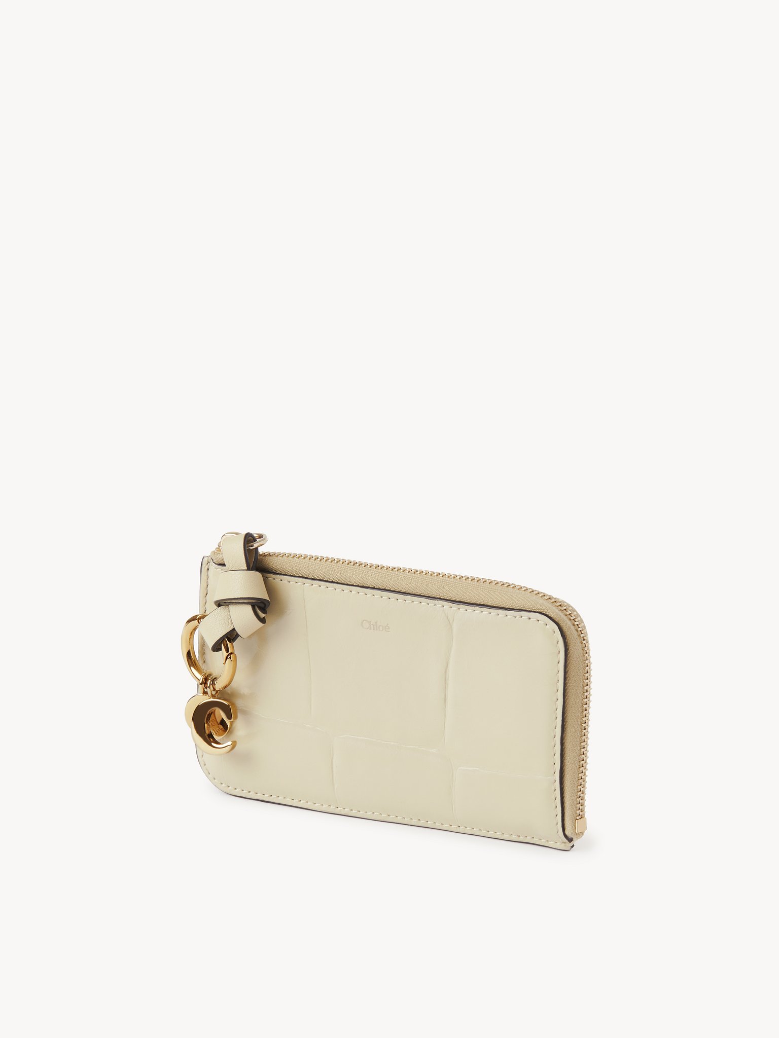 Alphabet wallet in croco-effect leather Croco-effect calfskin
Vegetal Beige Back view of the product