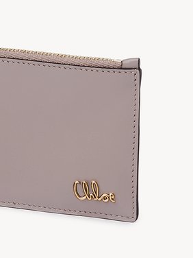 Small Chloé Iconic purse with card slots in shiny leather Shiny calfskin
Grizzled Purple Front view of the product being worn