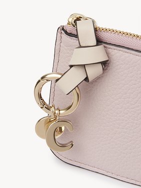 Alphabet purse in grained leather Grained & shiny calfskin
Pink - Beige Front view of the product being worn